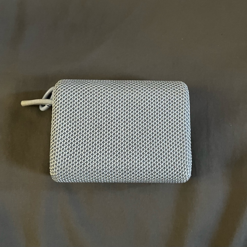 Light Blue Small Portable Speaker (it looks gray on the camera)